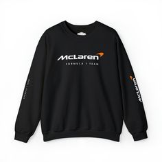 Formula 1 Sweatshirt | McLaren Racing Formula 1 team | Unisex Crewneck Sweatshirt Ideal for any situation, a unisex heavy blend crewneck sweatshirt is pure comfort.  ✅ Made from polyester and cotton - This combination helps designs come out looking fresh and beautiful.  ✅ The collar is ribbed knit, so it retains its shape even after washing. There are no itchy side seams on these sweaters.  ✅ Made with a medium-heavy fabric blend of 50% cotton and 50% polyester, this sweatshirt feels cozy and is Sports Season Crew Sweatshirt With Logo Print, Sports Season Logo Print Crew Sweatshirt, Crew Sweatshirt With Logo Print For Sports Events, Crew Neck Sweatshirt With Logo For Sports Season, Crew Neck Sweatshirt With Logo For Sports Events, Crew Neck Sweatshirt With Team Logo For Sports, Black Sweatshirt For Team Events, Black Casual Sweatshirt For Team Events, Black Sporty Sweatshirt For Team Events