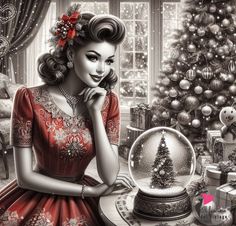 a woman sitting in front of a christmas tree next to a snow globe and presents