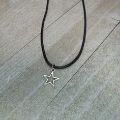 Dainty Star charm necklaces! * Features: * Create your own custom necklace * Star charm * Available in different cord styles These simple charm necklaces are so versatile! You can wear them separately or stack them with other necklaces! Each star charm pendant is 12 mm tall. This is tiny -- Just a bit over a centimeter. You can also choose your favorite cording. I offer different kinds: * 16-inch rainbow satin cord (with extender) * 18-inch black waxed cotton (with extender) * adjustable black c Simple Necklace Pendant, Black Star Charm Necklace, Adjustable Star-shaped Nickel-free Necklace, Nickel-free Adjustable Star Necklace, Simple Charm Necklace, Black Cord Necklace, Edgy Jewelry, Thread Necklace, Necklace Star