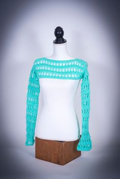 Such a cute, fun summer top. Pair with your favorite tank top or over your swimsuit. Either way you will end up loving this adorable top.  Size: S Neck opening: 14" Extra long sleeves All in stock items are ready to ship, no waiting. All items will arrive freshly washed and all items are individually packaged.  Also available in a chunky yarn, Please check out my entire shop, CuddleMeSoftlydaily.etsy.com Fitted Trendy Shrug For Summer, Trendy Fitted Summer Shrug, Trendy Fitted Shrug For Summer, Summer Cropped Stretch Shrug, Trendy Cropped Spring Shrug, Trendy Cropped Shrug For Spring, Casual Cropped Summer Shrug, Fitted Cropped Crop Top For Beach Season, Extra Long Sleeves