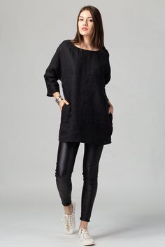 "Handmade oversized black linen tunic with boat neck and side pockets, perfect on its own as a beach coverup or paired with your favorite pants. FIT The REYA Tunic has a loose, oversized fit. The design has an intended positive ease of 42-46 cm/16.5-18\" around the bust. To choose the right size, check out our body and garments measurements charts displayed in the product listing photos. If you need specific sizing recommendations, please don't hesitate to contact us and we'll help you find the Oversized Black Casual Tunic, Black Linen Dress For Fall, Black Long Sleeve Linen Dress For Fall, Casual Oversized Tunic With Pockets, Black Linen Top With Pockets, Linen Clothing, Pants Fit, Clothing Plus Size, Product Listing