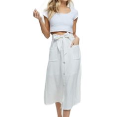 Linen Blend Ivory Paperbag Button Down Skirt Has Belt Hoops Around The Waist. Matching Long Linen Tie Belt. Built In Half-Slip. 70% Viscose, 30% Linen. High Waist Skirt With Buttoned Pockets For Summer, Chic Beach Bottoms With Buttons, Casual Summer Skirt With Buttoned Pockets, Chic Vacation Skirt With Pockets, White Buttoned Bottoms For Vacation, Chic Button-up Summer Skirt, Button-up Beige Skirt For Summer, Summer Skirt With Pockets For Day Out, Summer Day Out Skirt With Buttons