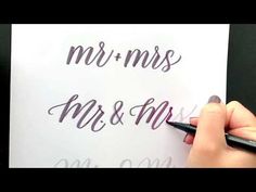 someone is writing the word mr and mrs on paper