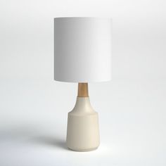 a white lamp with a wooden base on a plain surface, in the shape of a cone