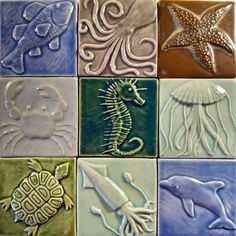 several different tile designs with sea animals on them