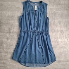 A Tencel Sleeveless Dress With A Drawstring Waist From Gap. Size Large. New With Tags, Never Worn. It Was A Bit Baggy On Top, So I Ordered A Size Down. Very Comfortable And Breezy. Good For Summer Or Cooler Fall Weather With A Sweater. Casual Blue Sleeveless Dress, Casual Blue Sleeveless Sundress, Casual Blue Sleeveless Dress For Day Out, Gap Sleeveless Cotton Dress, Sleeveless Cotton Dress By Gap, Gap Summer Sundress, Gap Fitted Sleeveless Mini Dress, Sleeveless Mini Dress By Gap, Fitted Sleeveless Mini Dress By Gap