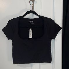 Garage Seamless Open Scoop Neck Tank Top Tee Jet Black Size Large. Ribbed, Stretchy Material. Great Condition, Never Worn, Tags Still On. Low Scoop Neck Top, Casual Black Scoop Neck Crop Top, Casual Black Crop Top With Scoop Neck, Trendy Seamless Scoop Neck Tops, Trendy Black Seamless Tops, Black Scoop Neck Top, Basic Black Crop Top With Scoop Neck, Trendy Black Crop Top With Scoop Neck, Trendy Black Scoop Neck Top