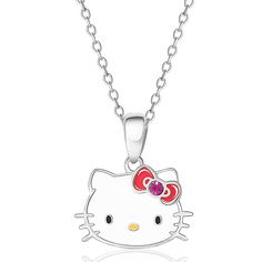 a hello kitty necklace with a pink bow on it