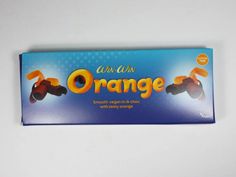 an orange candy bar sitting on top of a white table