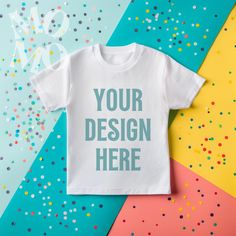 Introducing our sleek kids tshirt mockup featuring a neatly folded T-shirt on a minimalist, colorful background, perfect for designers who want to showcase their creations with clarity and style. This high-resolution flatlay arrangement ensures that your design is perfectly displayed, highlighting every detail against a clean and vibrant backdrop. Ideal for presenting your T-shirt designs in a professional and visually appealing manner, this mockup provides an unobstructed view, making it an ess Basic Crew Neck T-shirt For Birthday, White Branded T-shirt, Basic White Top For Birthday, White Basic Top For Birthday, Minimalist Colorful, Colorful Birthday, T Shirt Mockup, Tshirt Mockup, Shirt Mockup