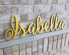 Nursery name sign in whimsical font style painted Above The Crib Decor, Baby Nursery Name Sign, Hanging Letters On Wall, Wooden Letters For Nursery, Dinosaur Decor Bedroom, Arrow Wood Sign, Crib Decor, Letter Nursery Decor, Large Wooden Letters