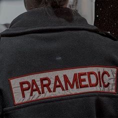 a paramedic jacket with the words paramedic written on it's back