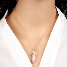 The symbol of love and the stone of hearty feelings - Rose Quartz Crystal There are endless reasons to have such a positive gemstone in your life. And, when it comes in the form of unique rose quartz necklaces, you just can’t miss having it. Prepared with love and care to support your values, this healing rose quartz necklace meaning revolves around emotional support, lovely energy, and blissful compassion. What you’ll get: Beautiful design: The rose quartz stone necklace contains a crown on top Rose Quartz Pendant Necklace, Rose Quartz Necklace Pendants, Quartz Pendant Necklace, Unique Roses, Trending Necklaces, Pink Rose Quartz, Rose Quartz Pendant, Rose Quartz Necklace, Rose Quartz Stone