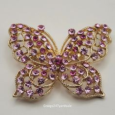 Up For Sale Is A Betsey Johnson Butterfly Pin/Brooch. Pin Is New Without Tags In Perfect Condition. Made In Gold Tone Metal And Covered In Purple Rhinestones. This Was Found In An Abandoned Storage Unit Actual History Is Unknown. Be Sure To Follow Me. We Are A Family Of Pickers And Resellers. You Never Know What Treasures We Will Find Next. Purple Rhinestone Party Brooches, Elegant Purple Rhinestone Brooches, Pink Rhinestone Party Brooch, Pink Rhinestone Party Brooches, Pink Party Brooches With Rhinestones, Vintage Chanel Handbags, Butterfly Pin, Purple Rhinestone, Betsey Johnson Jewelry