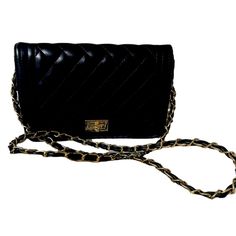 Black Quilted Crossbody Bag Gold Tone Hardware Turn Lock Closure Interior Black And White Striped Lining Zip Closure Pocket And 2 Slip Pockets Faux Leather 9.5 X 6.5” Never Used. Classic Black Bags As Fashion Accessory, Classic Black Bag As Fashion Accessory, Classic Party Bag With Chain Detail, Classic Party Bag With Chain, Chic Wallet On Chain With Shoulder Strap, Chic Wallet On Chain Styled As Shoulder Bag, Chic Formal Wallet On Chain With Mobile Phone Bag, Chic Formal Wallet On Chain With Phone Bag, Black Wallet On Chain For Everyday