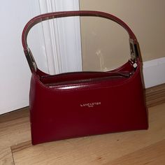 Bought In Paris, Never Worn. Beautiful Burgundy Color. Real Leather. Made In France. Comes With Dust Bag And Removable Chain. Size: Smalll Dark Red Shoulder Bag, Lancaster Bag, Burgundy Color, Lancaster, Dark Red, Lady In Red, Real Leather, Made In France, Red Color