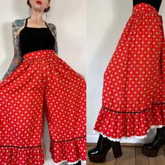 Cherry Bomb. Super fun & Rare Vintage 1960's/1970's Ellen Tracy cherry red calico bouquet floral cotton extra wide leg pants with RicRac ruffle hem, trimmed in eyelet & attached back waist tie. Oh man how I wish these were my size... another incredible pair of pants with the sweep of dreams, for all the warm weather frolicking.  ♥️♥️ Fit XS (I'm about a M), but please use measurements as fit guide.  12"-12.5" waist (on the half)  Fairly open hips  16.5" front rise  24.75" inseam  39.25" length e Vintage Cotton Pants With Floral Print, Vintage Wide Leg Pants With Floral Print, Vintage Wide Leg Floral Print Pants, Vintage Full Length Bottoms For Spring, Vintage Floral Print Summer Pants, Summer Cotton Bottoms With Flared Hem, Cotton Bottoms With Flared Hem For Summer, Fitted Vintage Bottoms With Ruffles, Spring Vintage Full Length Pants