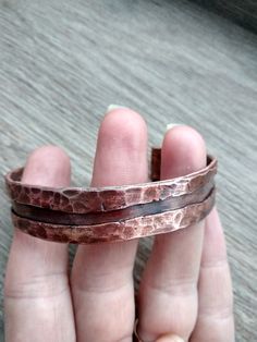 Handmade hammered stylish copper bracelet can be an excellent gift for Mеn or Women! This bracelet made of quality pure copper. Copper has been used since ancient times for it's natural and simple beauty. It's gorgeous with all skin tones and matches all your gold & bronzy jewelry. The bracelet can be made to order, personalized and adjustable for any size (just write me a message). You can added your inscription inside. Sizes is available in option "Bracelet length"   HOW TO CHOOSE THE RIGHT SI Handmade Rose Gold Copper Cuff Bracelet, Unique Hammered Bangle As Gift, Handmade Copper Bangle In Brown, Handmade Brown Copper Bangle, Hammered Copper Bangle Bracelet, Hammered Copper Bangle Bracelets, Unique Hammered Copper Bracelets, Unique Hammered Cuff Bracelet Gift, Hammered Rose Gold Cuff Bracelet Gift