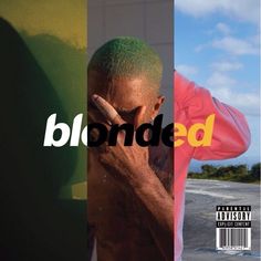 a man standing next to a wall with the word blonded on it's side