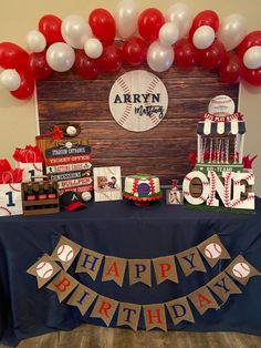 a baseball themed birthday party with red, white and blue balloons