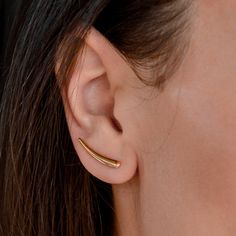 Lovely 24k gold cuff earrings in minimalist style. Look great on the ear, go under any style of clothing. What is Gold Vermeil Gold Vermeil - is genuine .925 sterling silver that has been expertly plated with a thick layer of 14k-24k gold. Advantages Gold Vermeil: * Base of high-quality sterling silver * A thick gold layer of at least 10k * Most of the time 14k-24k gold is used * Industry regulated gold thickness of no less than 2.5 microns (very thick). 24k Gold Plated Ear Climbers - Gold Ear C Gold Ear Climbers For Everyday, Everyday Gold Ear Climbers, Modern Gold Ear Climbers For Everyday, Gold Ear Cuff With Matching Earrings For Everyday, Minimalist Ear Cuff With Matching Earrings For Everyday, Minimalist Ear Cuff With Matching Earrings, Modern Everyday Gold Ear Climbers, Everyday Minimalist Yellow Gold Ear Climbers, Gold Minimalist Pierced Ear Climbers