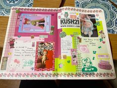 an open scrapbook with pictures and stickers on it