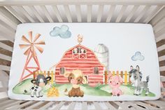 a baby crib with farm animals painted on it