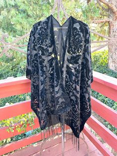 Black Velvet kimono, Burnout Kimono, night, dress, bathrobe, black, Devore, Velvet Robe, Handmade Velvet Burnout semi sheer in A damask design print design,  fringe hem Armholes Side slits Open front kimono, jacket. great for wearing over jeans, shorts, dresses and bikinis. Loose fitting fits size 6 to 22 Measurements:  width 36" (  74" all the way around) Length 31" fringe is an additional 6" 442 Black Velvet kimono, Burnout Kimono, night, dress, bathrobe, black, Devore, Velvet Robe, Handmade Bohemian Long Black Robe, Bohemian Black Long Robe, Black Long Bohemian Robe, Long Black Bohemian Robe, Black Bohemian Robe With Kimono Sleeves, Bohemian Black Robe With Kimono Sleeves, Black One Size Kimono, Winter Black Robe For Loungewear, Black Winter Loungewear Robe