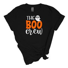 The Boo Crew Halloween T-Shirt Get ready to celebrate the spookiest season with our exclusive Boo Crew Halloween T-Shirt! Perfect for trick-or-treating, parties, or cozy nights in, this shirt is designed to bring festive fun to your wardrobe. Key Features: Playful Design: Choose between a bold solid "BOO" or a sparkling glitter "BOO" to match your style. Both options feature a fun, eye-catching font that captures the spirit of Halloween! Comfortable Fit: Made from soft, breathable fabric, this t Halloween Themed Pre-shrunk T-shirt, Pre-shrunk Themed T-shirt For Halloween, Fall Themed T-shirt With Letter Print, Spooky Black T-shirt For Costume Party, Black T-shirt With Letter Print For Costume Party, Spooky Letter Print T-shirt For Costume Party, Black Crew Neck T-shirt For Costume Party, Halloween Costume Party T-shirt With Letter Print, Halloween Letter Print T-shirt For Costume Party