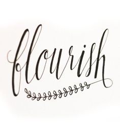 the word flourish written in cursive writing on a white paper with black ink