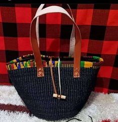 Our unique African bag/masaai bag are made from sisal ans and leather, they are purely handmade and creatively designed for our clients, they can be designed according to our clients taste and preference. Handwoven Leather Tote Crochet Bag, Handmade Leather Casual Bag, Handwoven Leather Crochet Tote Bag, Black Woven Leather Straw Bag, Handwoven Leather Crochet Bag, Casual Handmade Leather Bag, Traditional Black Rectangular Crochet Bag, Casual Handwoven Leather Straw Bag, Casual Handwoven Leather Bag