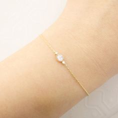 * One rose cut diamond bracelet * Natural rose cut diamond approx. 0.10-0.15ct gh, vs-s * Two natural accent diamonds, 0.02ctw * Solid 14k gold chain adjustable at 6.5" or 7" * Spring ring clasp closure * Ethically sourced solid 14k yellow gold and gemstones * Packaged in a recyclable kraft jewelry box Elegant Gold Bracelet In Diamond White For Gifts, Delicate Diamond Chain Bracelet With Diamond Accents, Delicate Diamond Chain Bracelet With Accents, Delicate Diamond Jubilee Bracelet, Dainty Diamond White Bracelets For Formal Occasions, Dainty Rose Gold Bracelet With Brilliant Cut, Delicate Diamond Bracelet For Anniversary, Elegant Chain Bracelet With Single Cut Diamonds As Gift, Elegant Diamond White Chain Bracelet Gift