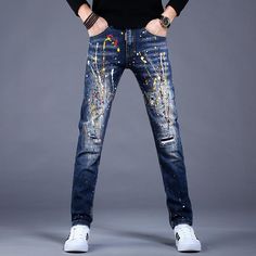 Straight Leg Cotton Jeans With Paint Splatter, Straight Leg Paint Splatter Jeans, Casual Spring Pants With Paint Splatter, Paint Splatter Straight Leg Denim Jeans, Spring Denim Jeans With Graffiti Print, Spring Fitted Jeans With Paint Splatter, Spring Graffiti Print Denim Jeans, Trendy Paint Splatter Denim Jeans, Trendy Cotton Jeans With Graffiti Print