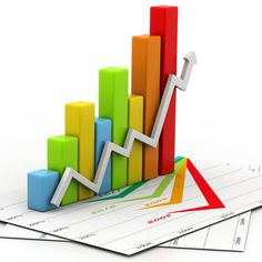 a colorful bar chart with an arrow pointing upward on top of it, sitting on some papers