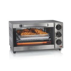 The Sure-Crisp Air Fryer Toaster Oven combines Sure-Crisp air frying functionality with the versatility of a classic toaster oven. You get the even crisping and browning of air frying right on your countertop, along with the ability to toast, bake and broil. Using little to no oil, the Sure-Crisp function turns fresh or frozen French fries, chicken wings, steaks, fish, vegetables, and more into crispy deliciousness that you and your family will love. It's easy to use — just add food to the mesh Best Rated Air Fryer, Small Toaster Oven, Air Fryer Toaster Oven, Fries Chicken, Yummy Fries, Convection Toaster Oven, Frozen French Fries, Countertop Oven, Best Air Fryers