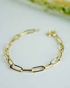 14K Solid Gold Paper Clip Bracelet, Gold Paperclip Chain Wristband, Real Gold Bracelet, Rectangle Chain, Chic Chain Bracelet, Dainty Bracelet, Chic Gift for Her, Gift for Valentine, Delicate Bracelet - With our 30 years of experience in the gold and jewelry industry, it is a great source of pleasure for us to produce useful jewelry that you can wear with pleasure. - Every woman is special. And all women are more precious to us than any jewel. I wish you a pleasant shopping experience. - Thank yo Paper Clip Bracelet Gold, Paperclip Chain Bracelet, Gold Rectangular Paperclip Bracelet With Lobster Clasp, Modern Rectangular Gold Bracelet With Box Chain, Modern Rectangular Paperclip Chain Bracelet, Classic Paperclip Bracelet With Rectangular Solid Links, Classic Paperclip Bracelet With Solid Link Construction, Classic Rectangular Paperclip Bracelet With Box Chain, Formal Rectangular Chain Bracelet With Lobster Clasp