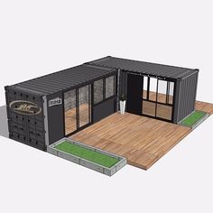 a shipping container with its doors open on top of a wooden floor next to a planter