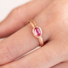 Our ancient inspired Parthian stacking ring is set with an oval cabochon (smooth rather than faceted) pink tourmaline stone. Stone measures 6mm x 4mm. Approx band width 2.6mm - 1.7mm at back of band. Approx weight: 2.3g in Silver, 2.5g in 9ct. Pictured here with matte finish. For a high shine finish please leave a note at checkout. Oval Ruby Ring In Rose Gold With Bezel Setting, Tourmaline Bezel Set Ring In Oval Cabochon, Tourmaline Ring With Bezel Setting In Oval Cabochon, Tourmaline Bezel-set Oval Cabochon Ring, Tourmaline Stone, Stacking Ring, Oval Cabochon, Pink Tourmaline, Stacking Rings