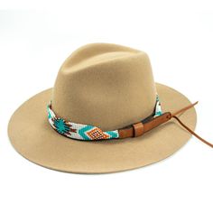 Price includes a Lola Sambboho hat & an Aztec Flat hatband. Save 10% with this bundle. Select hat size. Hatband is one size fits all. Hatband is removable.  An iconic must-have Fedora hat that will never get out of fashion. Sambboho's Lola hat has a soft brim and indented crown. A chic piece to be worn at all seaso Cheap Brown Hat Bands For Festivals, Bohemian Travel Hat With Curved Brim, Bohemian Curved Brim Hat For Travel, Adjustable Bohemian Straw Hat For Outdoor, Adjustable Bohemian Straw Hat For Travel, Adjustable Western Fedora For Travel, Adjustable Country Style Fedora For Travel, Adjustable Beach Fedora One Size, Bohemian Adjustable Panama Hat For Travel