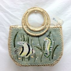 100% Straw Bag Great Quality. Perfect For Your Vacation, Cruise, Trip To The Beach Or Everyday. Embroidery, Beads, Sequins This Bag Has It All. Zipper Closure. 9” Tall (Excluding The Handle) X 12” Long 4” Wide. Circle Handle Is A 5” Drop. Inside Back Has A Zipper Pocket 5 1/2” X 5 1/2” . Beach Embroidered Natural Shoulder Bag, Beige Embroidered Straw Bag For Beach, Embroidered Beige Beach Bag, Beige Embroidered Beach Bag, Embroidered Bucket Bag For Vacation, Green Embroidered Beach Bags, Embroidered Natural Bags For Beach, Embroidered Natural Bags For The Beach, Embroidered Bucket Bag For Beach