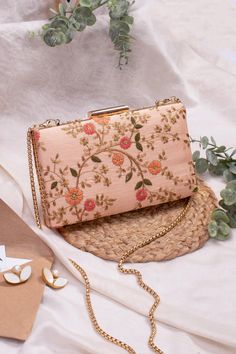 "Our Floral creeper clutches are super-hot, year-round! The traditional silhouette with exquisite floral embroidery and the metal chain sling are perfect to add that oomph to your overall look and make a strong style statement, no matter what the occasion. Embroidered front and back. Dimensions (LxB): 8\"x4.5\" Handle length: 47\" Handle drop: 23\" Material: Embroidered poly silk, suede lining, gold metal clutch frame, gold metal sling. Features: metal lock closure, detachable metal sling" Embroidery Purse, Bridal Boxes, Strong Style, Hand Bags For Women, Diy Clutch, Grandma Fashion, Floral Purse, Cute Wallets, Makeup Bag Organization