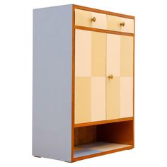 a cabinet with two doors and drawers on one side, the door is open to reveal an area that appears to be empty