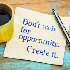 a napkin with the words don't wait for opportunity create it on it next to a cup of coffee