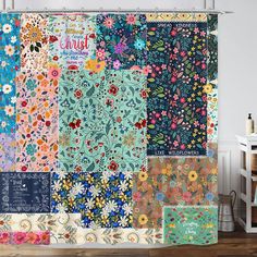 the shower curtain is decorated with colorful flowers