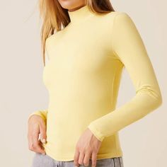 Shein Long Sleeved Turtleneck T-Shirt In Yellow Size Small. Very Lightly Ribbed Material. 14” Underarm To Underarm, 21” Long From Neckline To Bottom At Center Of Back. All Measurements Are Approximate And Taken Laid Flat. No Hang Tags, Comes In Original Packaging, Only Removed For Pictures And Measurements. Hem On Collar Is Not Centered On Back. It Will Wear Just Fine But It Is Off-Centered. Yellow Trendy Turtleneck Top, Spring Solid Turtleneck T-shirt, Basic Yellow Tops For Fall, Basic Yellow Fall Tops, Yellow Turtleneck Top For Spring, Turtleneck And Tshirt, Turtleneck T Shirt, Spring Women, Shein Tops