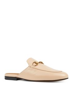 Gucci Women's Princetown Leather Mules Gold Mules For Spring Workwear, Chic Gucci Loafers For Business, Elegant Gold Mules For Workwear, Elegant Mules With Branded Heel Counter For Work, Elegant Mules For Work With Branded Heel Counter, Luxury Beige Mules For Formal Occasions, Elegant Beige Mules For Office, Classic Gold Mules For Spring, Luxury Mules With Branded Heel Counter For Work