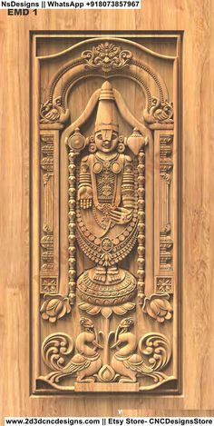 an intricate carved wooden door with carvings on it