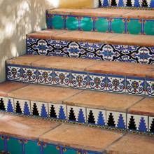 the steps are decorated with blue and white tiles