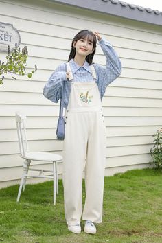 Classic high waisted overalls with a loose boyfriend fit and straight legs. Ditsy wildflower embroidered bib with side pockets and back pockets. Cut open button holes with scissors S: 31.5" waist, 37" hips, 12" rise, 24" thighs, 25" inseamM: 33" waist, 38.5" hips, 12" rise, 25" thighs, 25" inseamL: 34.5" waist, 40" hips, 12" rise, 26" thighs, 25" inseam How to attach buckles:Slide the rectangular buckle on first, followed by the T-shaped buckle. Overall straps will hold on its own as such or you Flower Embroidery Overalls, Spring High-rise Utility Overalls, Washed Cotton Overalls With Bib Front, Embroidered Overalls Flowers, White Bib Front Overalls With Pockets, High Waisted Overalls, Boyfriend Fit, Overall Dress, Sweater Blouse