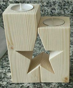 a candle holder made out of wooden blocks